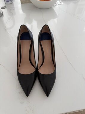 Stuart Weitzman Black Pointed-Toe Leather Pumps with Nude Insole